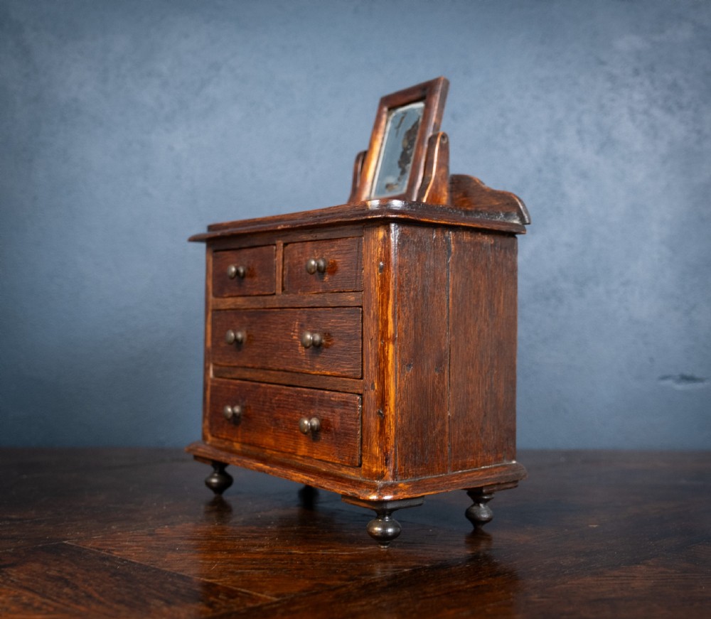Miniature Early 19th Century Oak Chest Of Drawers With Swing Mirror View X