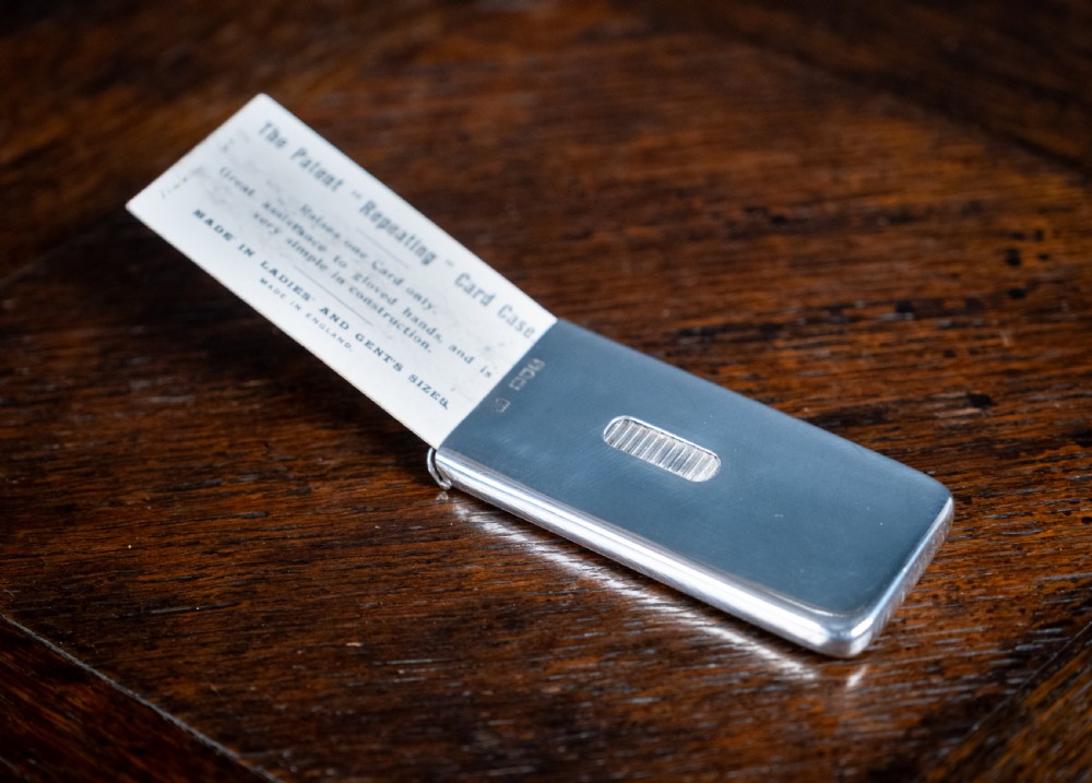 Silver 'Patent Repeating Card Case' by Sampson & Morden, London, 1913.
