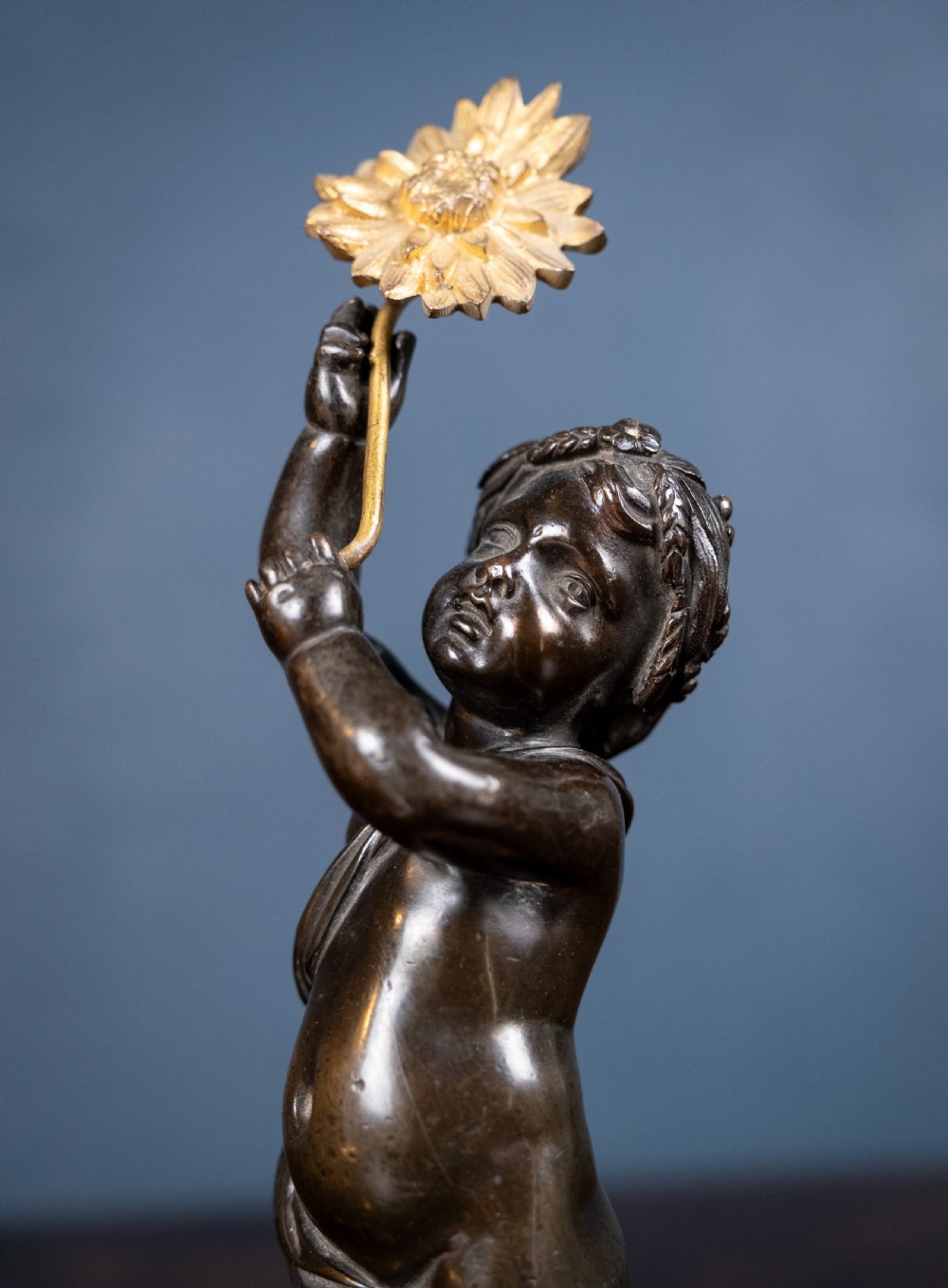 19th Century Bronze Putto Holding A Flower View VIII