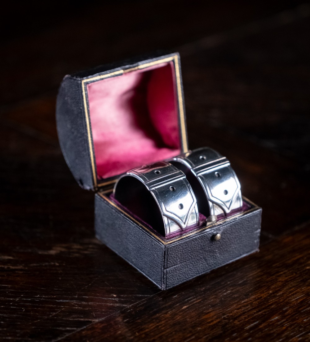 Cased Pair Silver Belt Buckle Napkin Rings by James Dixon & Sons, 1894. View II