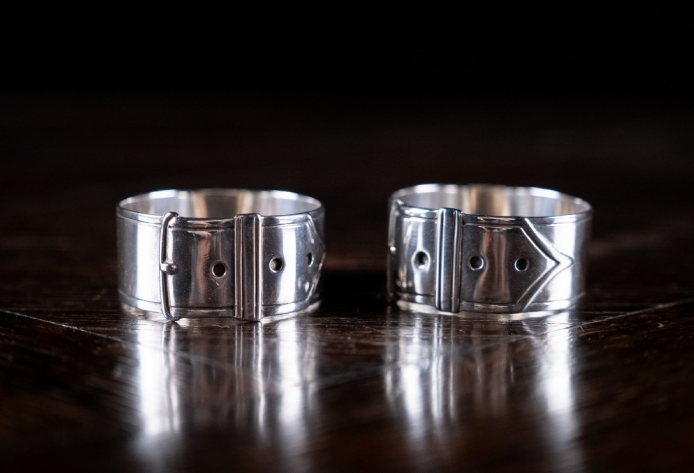Cased Pair Silver Belt Buckle Napkin Rings by James Dixon & Sons, 1894. View IV