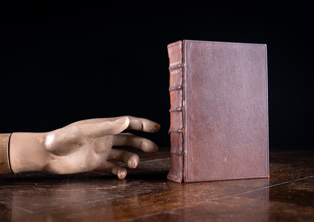 A six-volume set of Victorian brown leather-bound books featuring gilt spine lettering and raised bands. View XIII