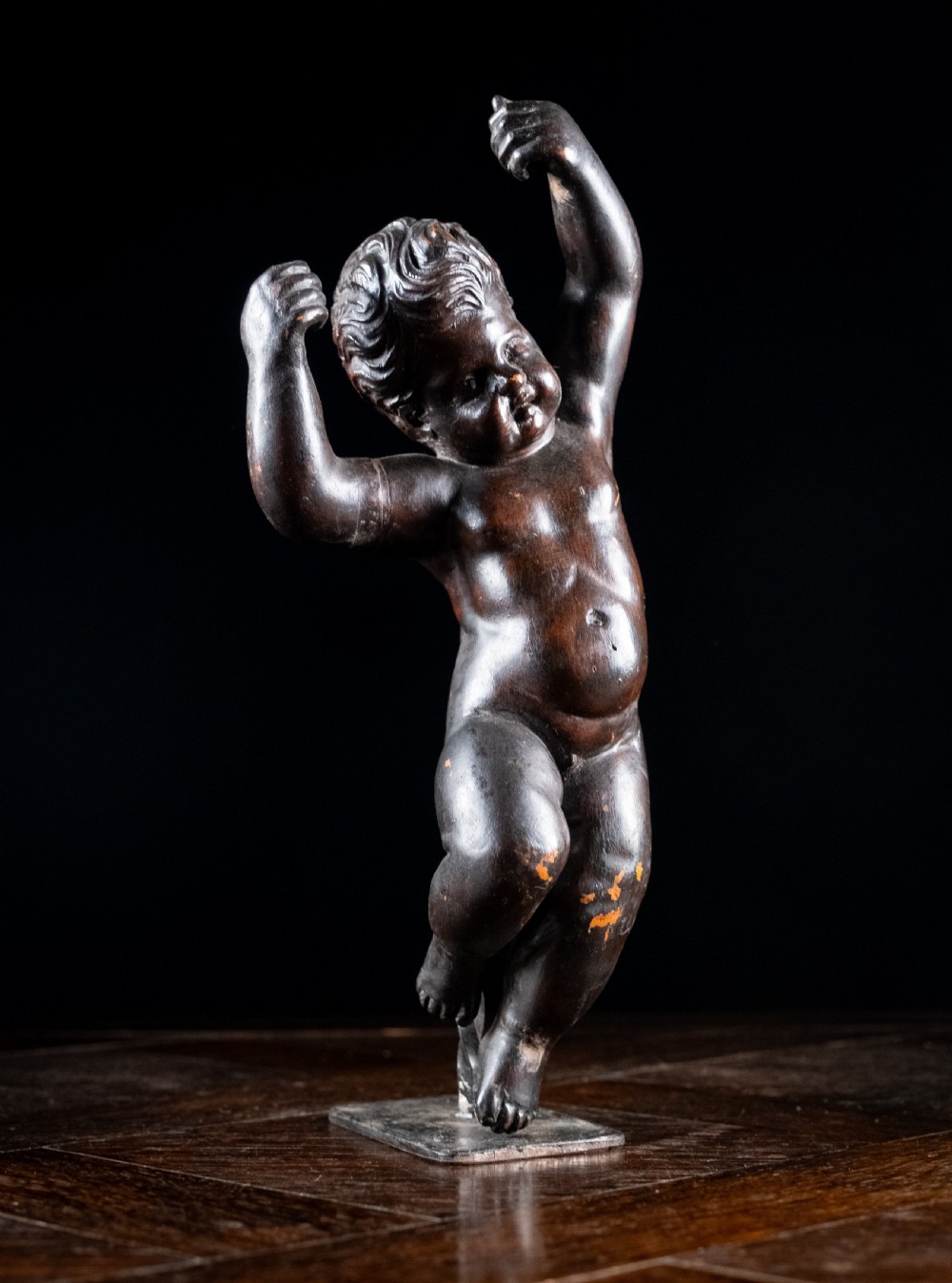 19th Century Ebonised Carved Putto View II