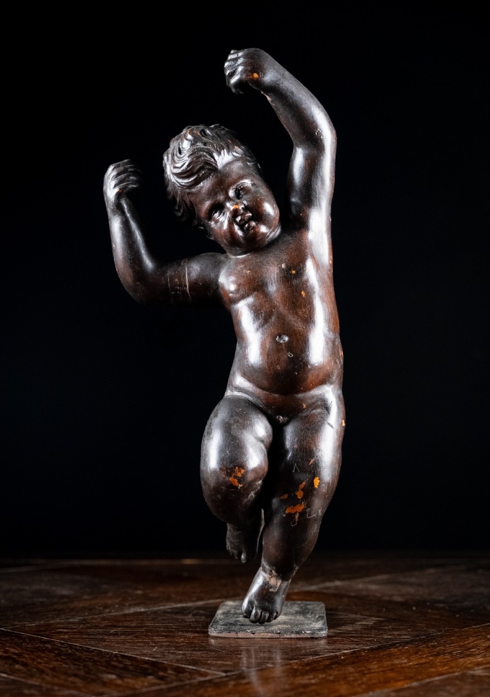 19th Century Ebonised Carved Putto