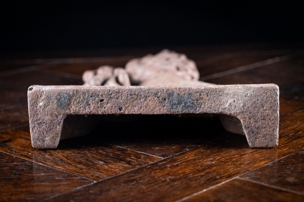 A nineteenth-century cast iron doorstop featuring a detailed rampant lion leaning against a scroll motif on a moulded plinth base. View VIII