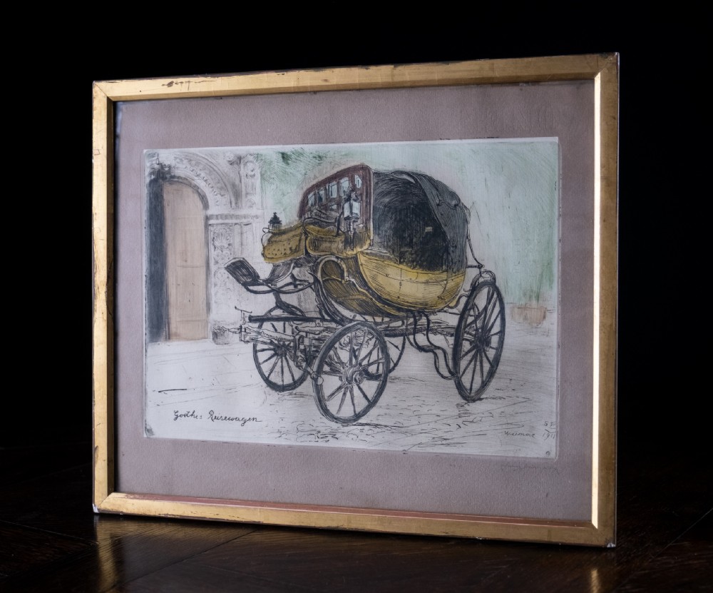 A framed 1911 etching by Ludwig Michalek depicting Goethes travelling carriage set within a gilt wood frame.