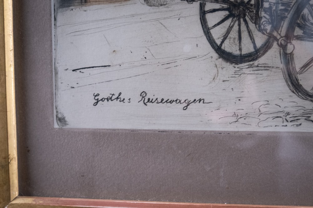 A framed 1911 etching by Ludwig Michalek depicting Goethes travelling carriage set within a gilt wood frame. View VI