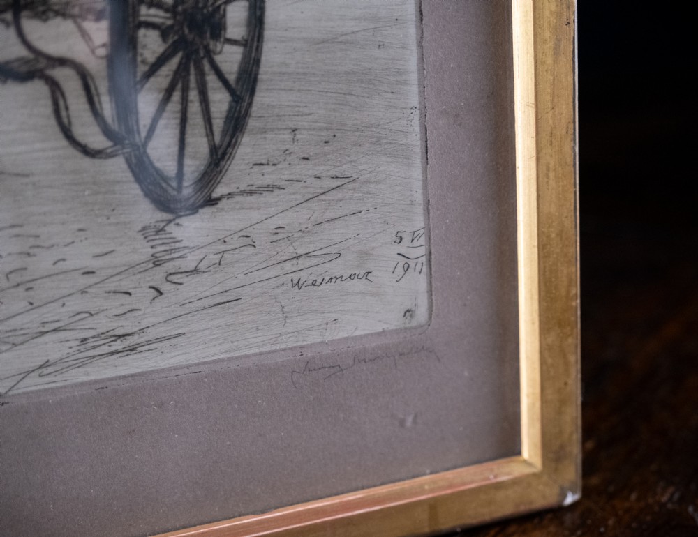 A framed 1911 etching by Ludwig Michalek depicting Goethes travelling carriage set within a gilt wood frame. View VII