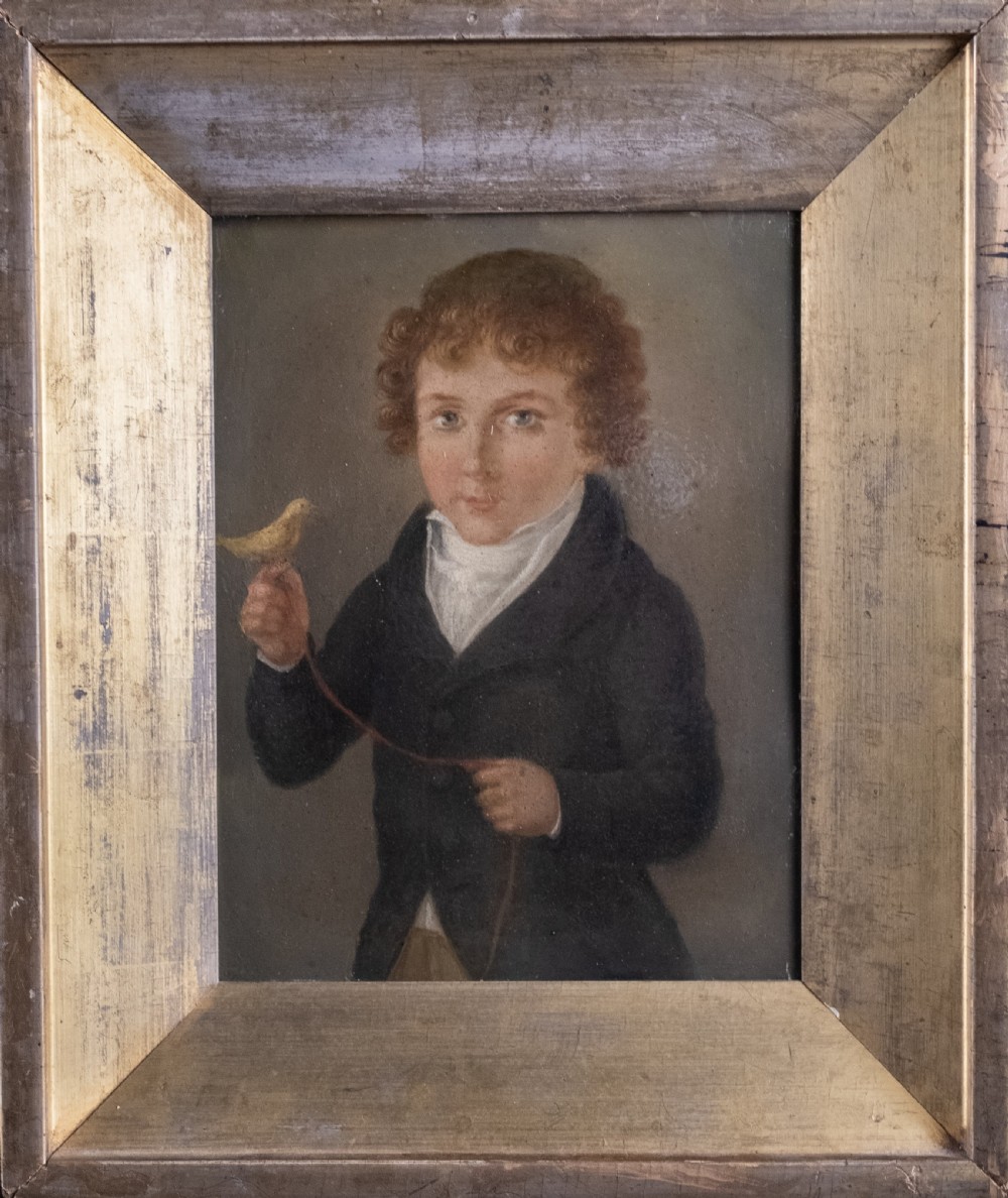 Early 19th Century Boy With Bird (American School). Oil On Tin.