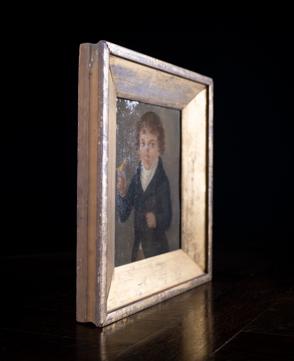 Early 19th Century Boy With Bird (American School). Oil On Tin. View VI