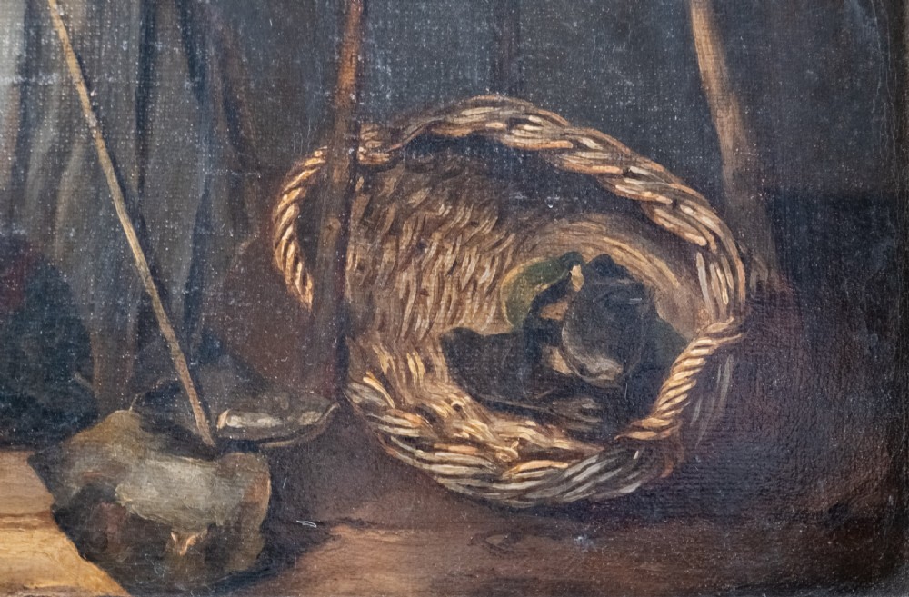 A 19th-century oil painting depicting a seated cobbler working at a bench, encased within an ornate gilded frame with shell corner detailing. View V