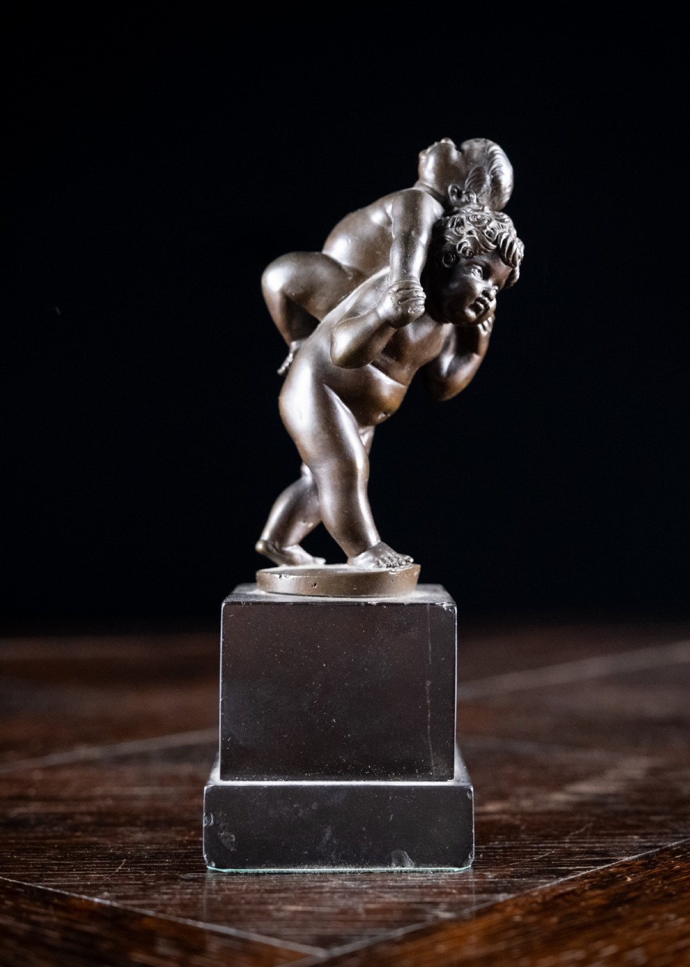 Bronze Putti Playing Piggyback After Leonhard Kern (1588-1662) View III