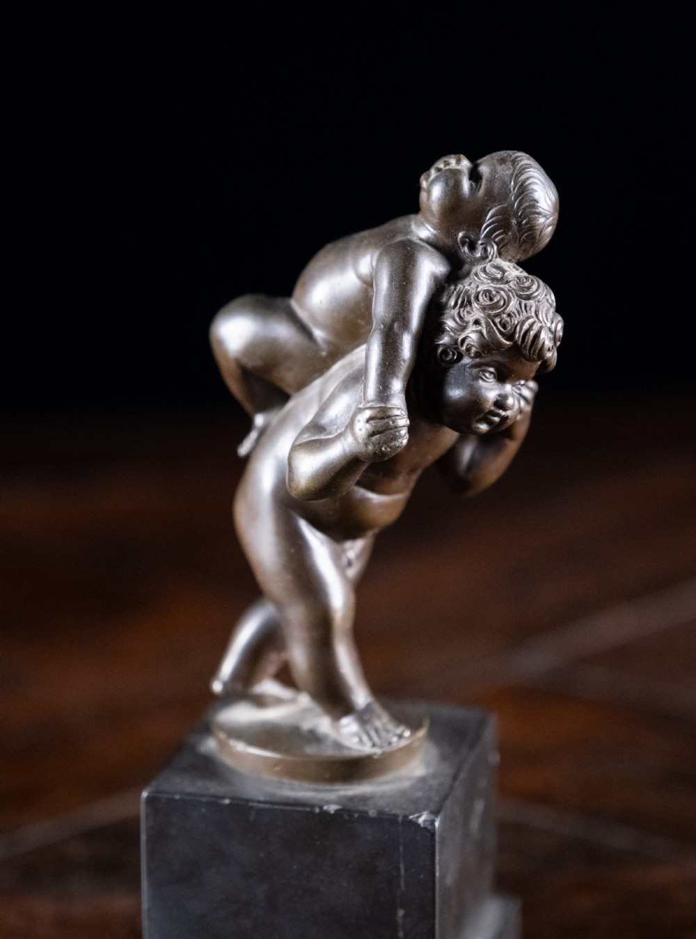 Bronze Putti Playing Piggyback After Leonhard Kern (1588-1662) View IV