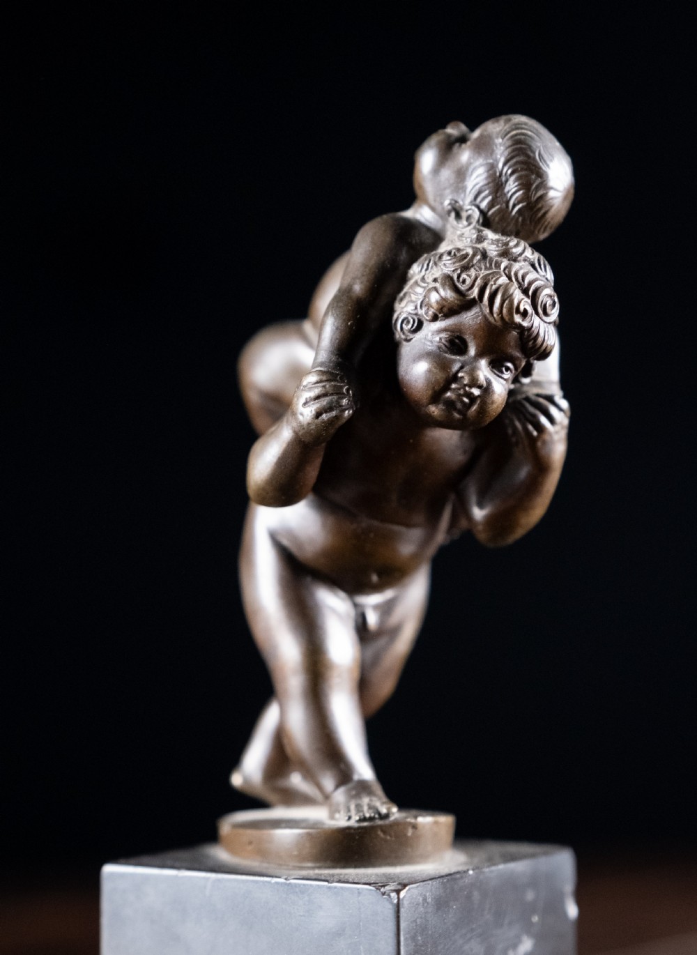 Bronze Putti Playing Piggyback After Leonhard Kern (1588-1662) View V