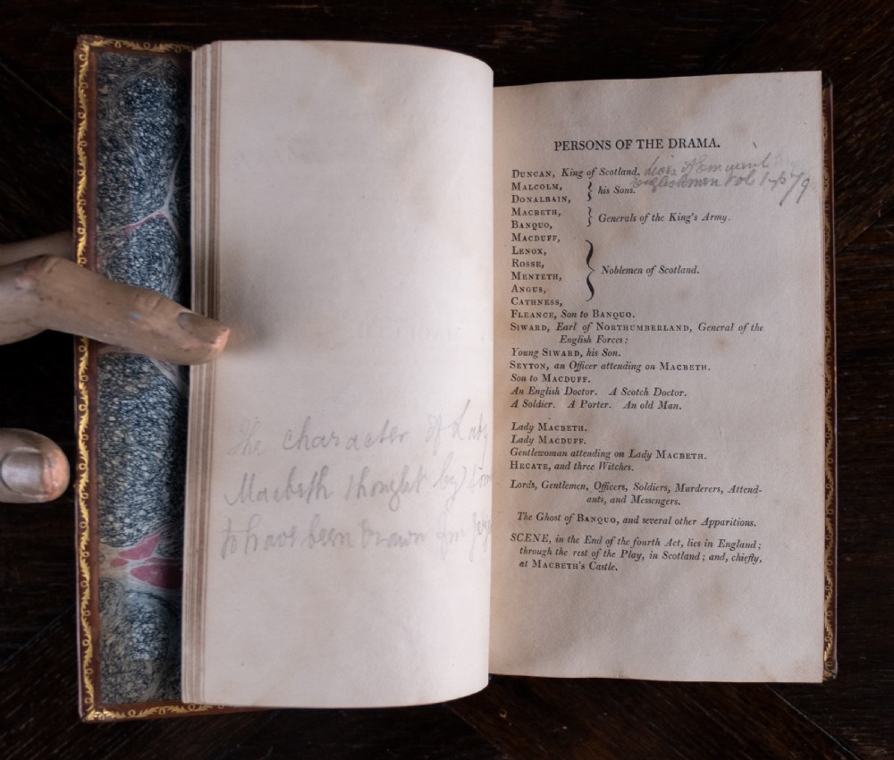 A complete twelve-volume set of brown leather-bound books printed in 1807 with gold-tooled decorative spines. View XIX