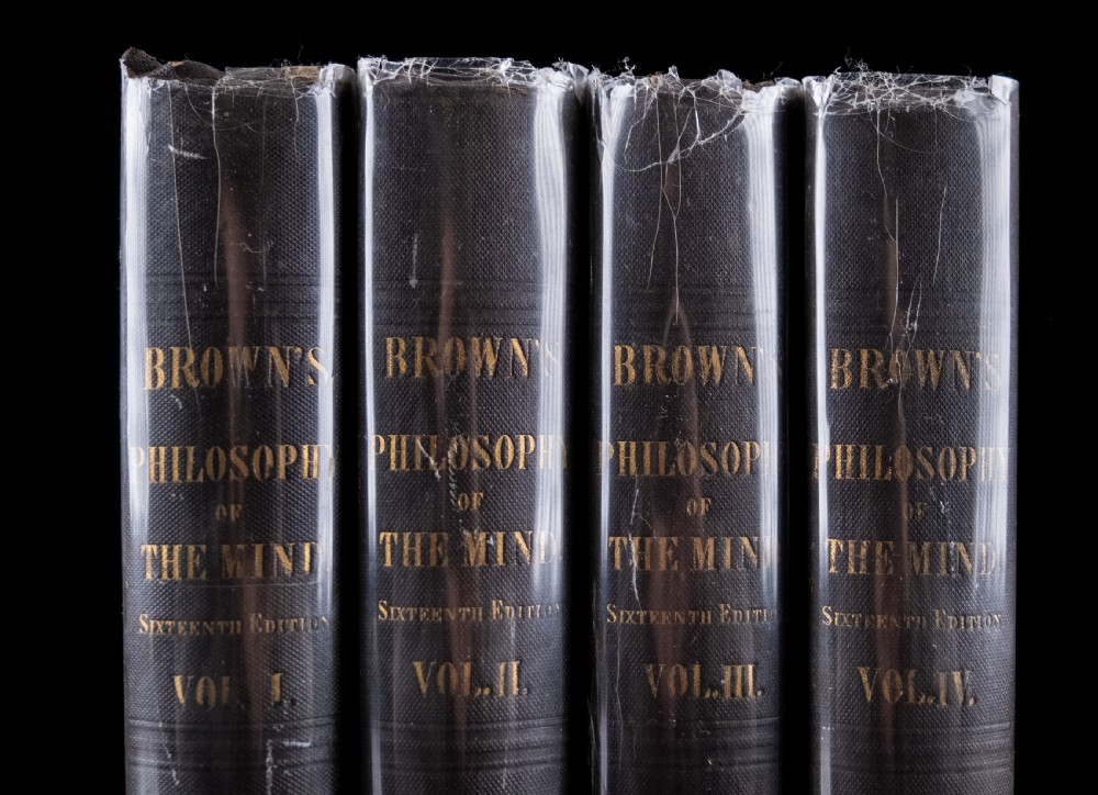 A complete four-volume set of 1846 antique books titled Browns Philosophy of the Mind with gilt lettering on dark grey spines. View II