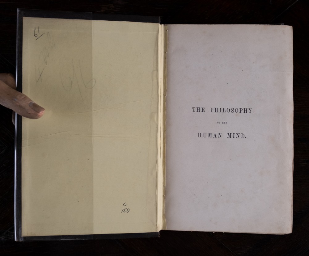 A complete four-volume set of 1846 antique books titled Browns Philosophy of the Mind with gilt lettering on dark grey spines. View III