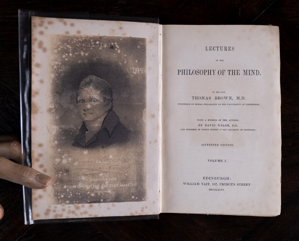 A complete four-volume set of 1846 antique books titled Browns Philosophy of the Mind with gilt lettering on dark grey spines. View VI