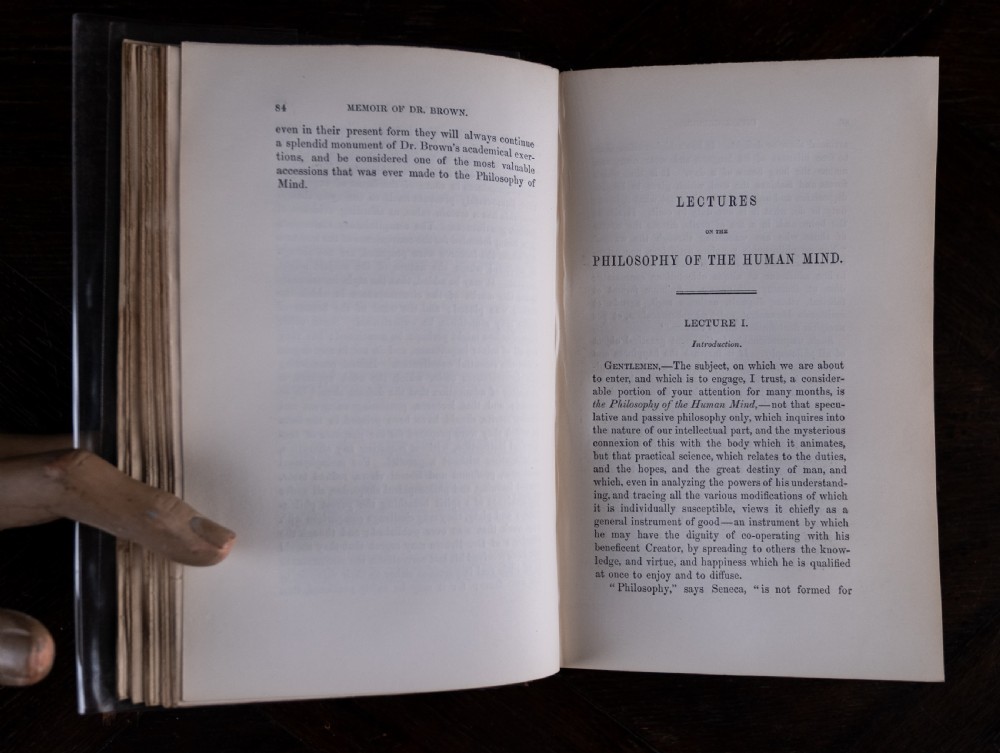 A complete four-volume set of 1846 antique books titled Browns Philosophy of the Mind with gilt lettering on dark grey spines. View XI