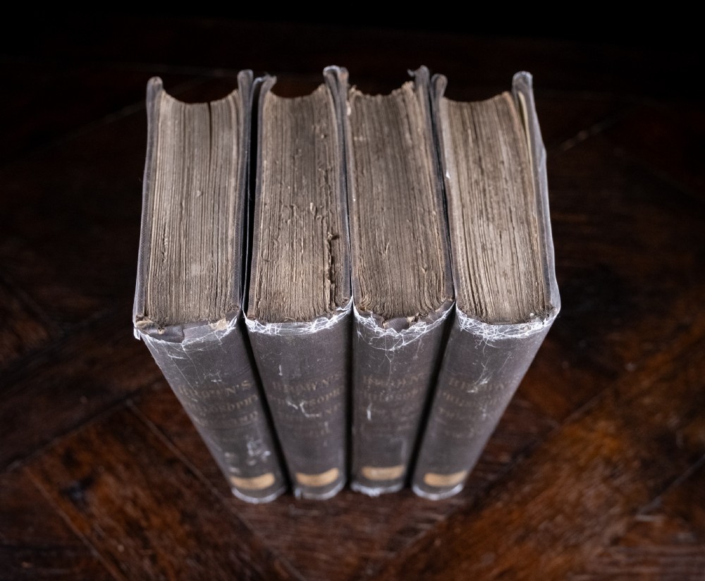 A complete four-volume set of 1846 antique books titled Browns Philosophy of the Mind with gilt lettering on dark grey spines. View XIV