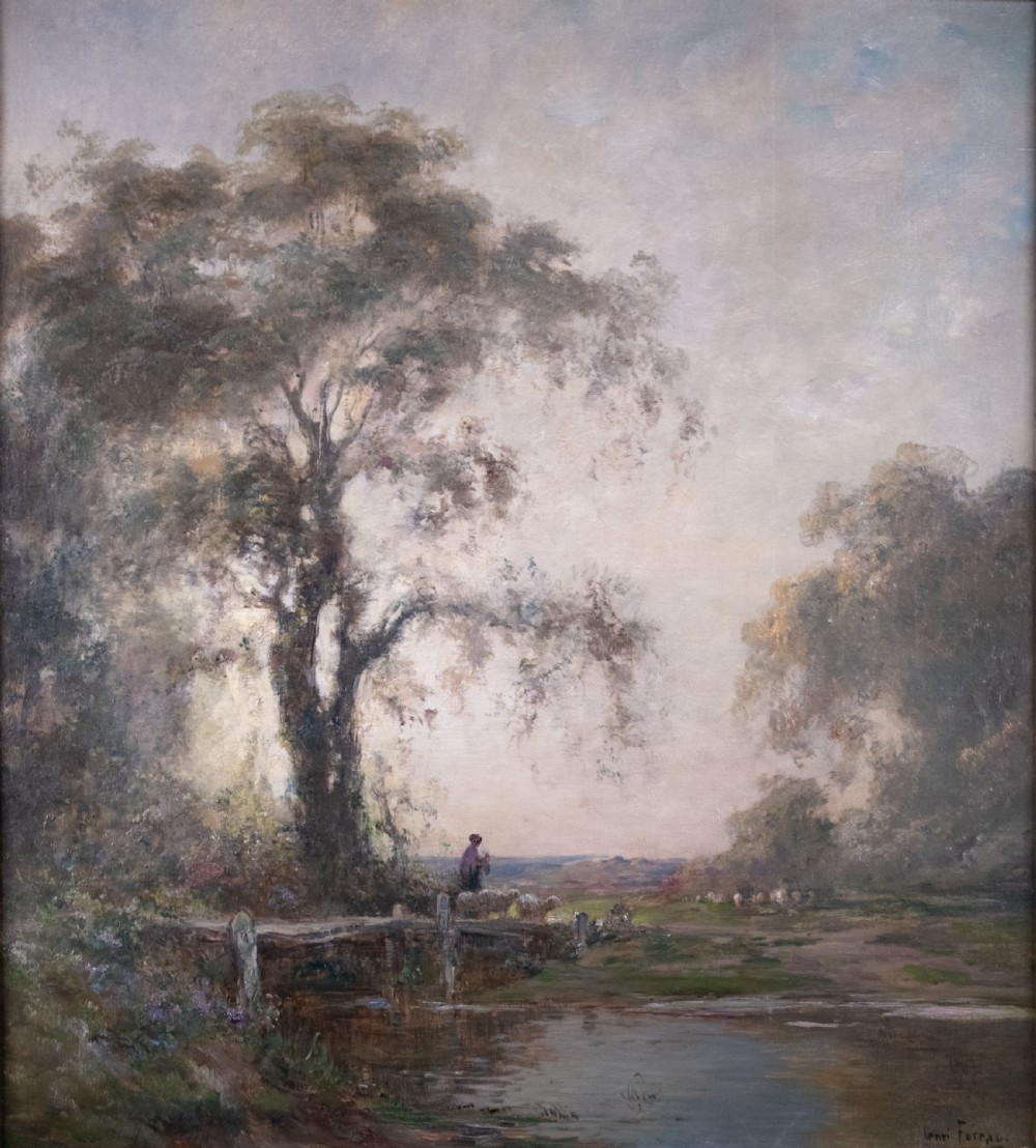 An impressionist oil painting depicting a rural countryside landscape with a large tree by a river, enclosed within an ornate gilded frame. View IV