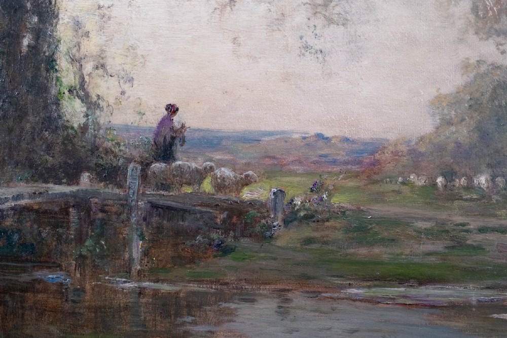An impressionist oil painting depicting a rural countryside landscape with a large tree by a river, enclosed within an ornate gilded frame. View V