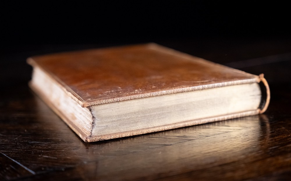 A 1904 leather-bound book titled Life of William the Second German Emperor standing vertically with gilt detailing on the spine. View VI