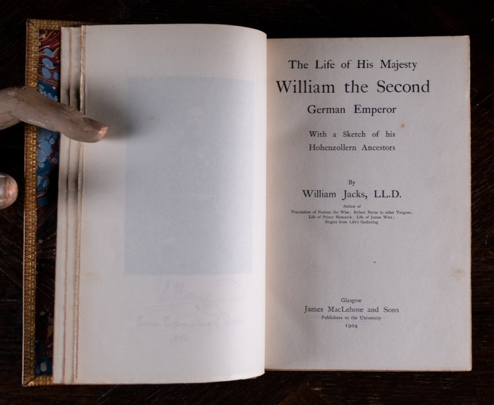 A 1904 leather-bound book titled Life of William the Second German Emperor standing vertically with gilt detailing on the spine. View XIII