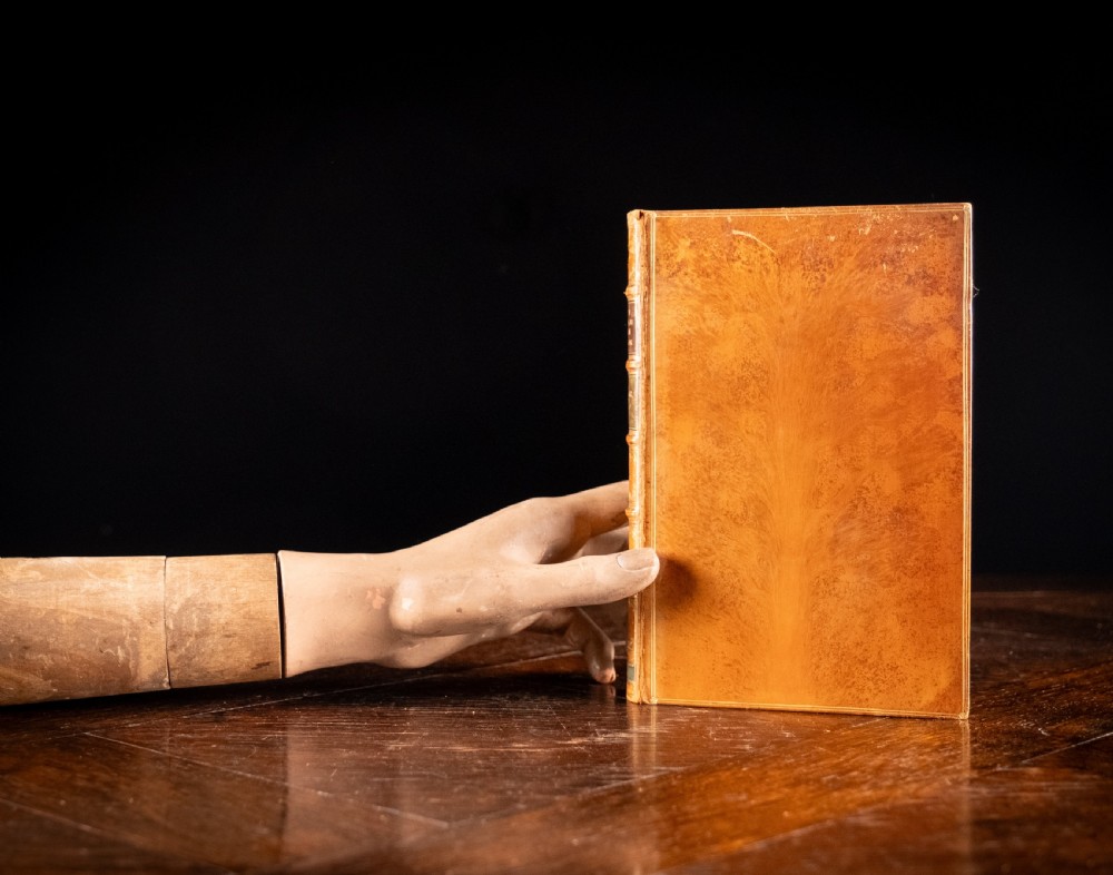 A 1904 leather-bound book titled Life of William the Second German Emperor standing vertically with gilt detailing on the spine. View XVII