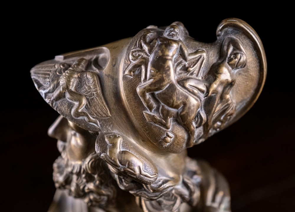A nineteenth-century gilt bronze sculptural bust depicting the classical hero Ajax in profile, wearing an ornate helmet and mounted on a turned pedestal base. View IV