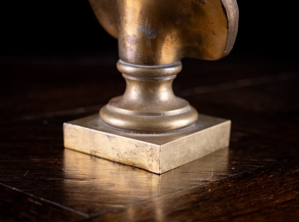 A nineteenth-century gilt bronze sculptural bust depicting the classical hero Ajax in profile, wearing an ornate helmet and mounted on a turned pedestal base. View XI