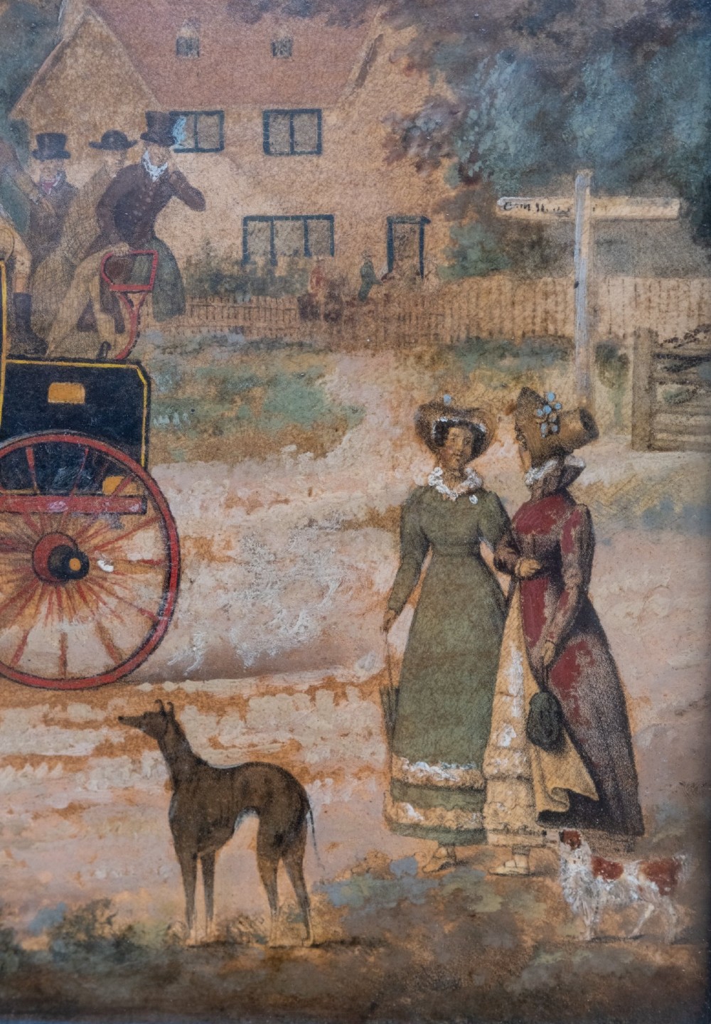 A framed 19th-century oil painting on board depicting a horse-drawn stagecoach travelling along a rural dirt road past figures and a cottage under a cloudy sky. View IV