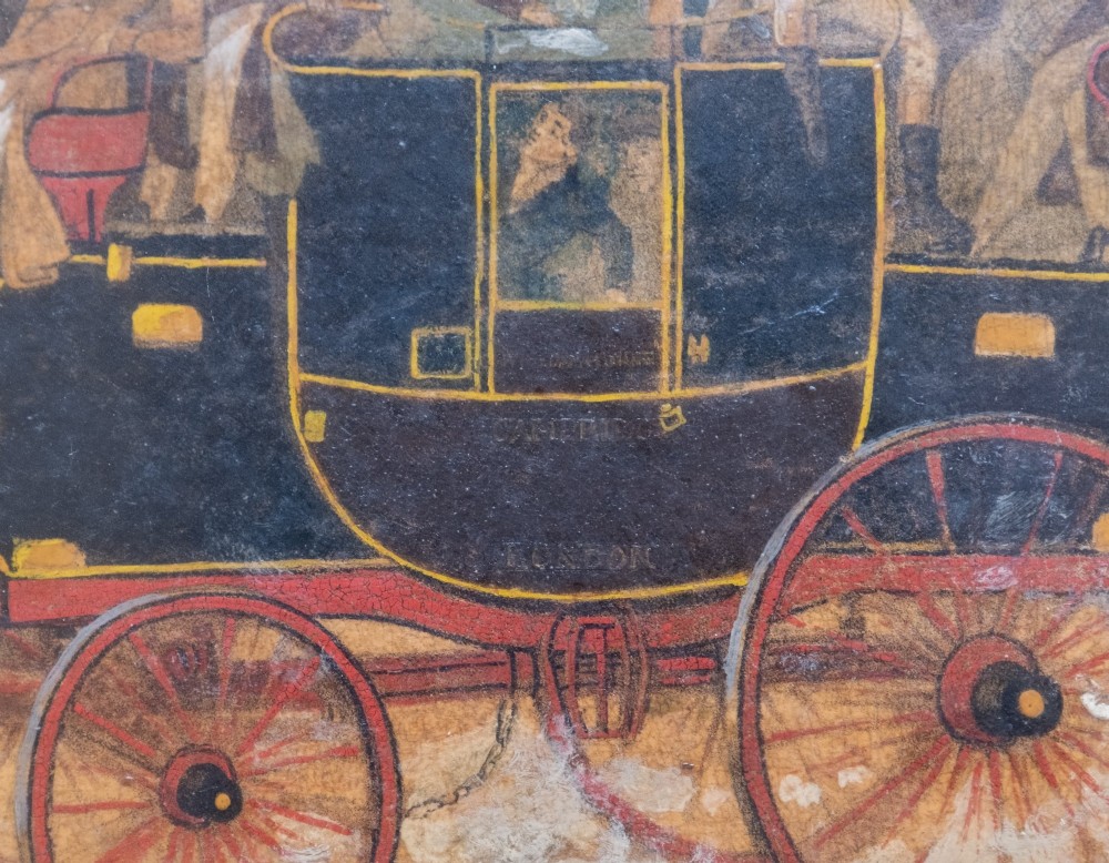 A framed 19th-century oil painting on board depicting a horse-drawn stagecoach travelling along a rural dirt road past figures and a cottage under a cloudy sky. View VI