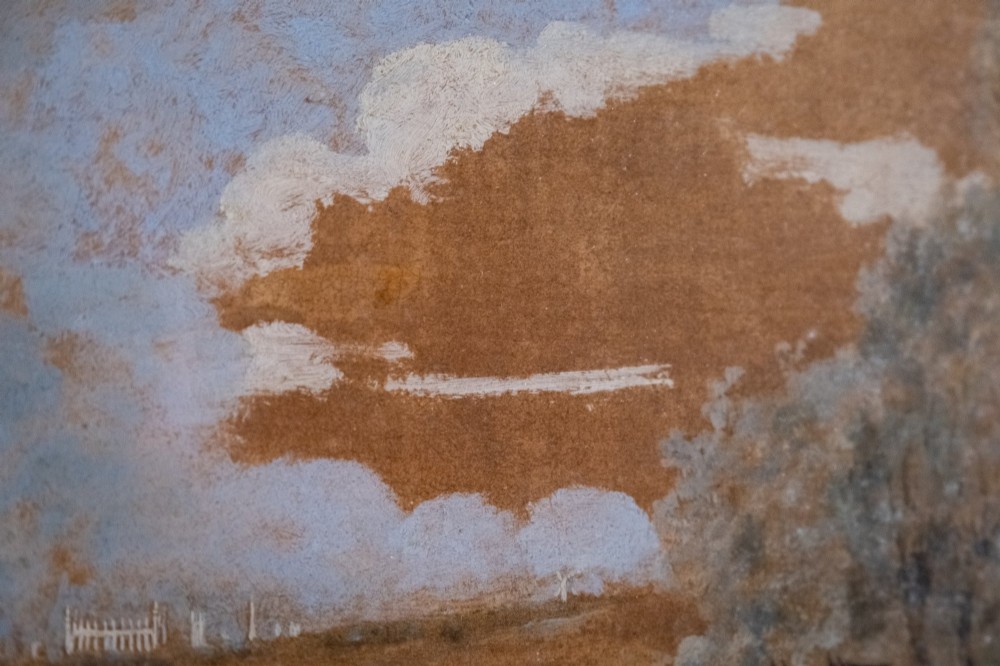 A framed 19th-century oil painting on board depicting a horse-drawn stagecoach travelling along a rural dirt road past figures and a cottage under a cloudy sky. View VII