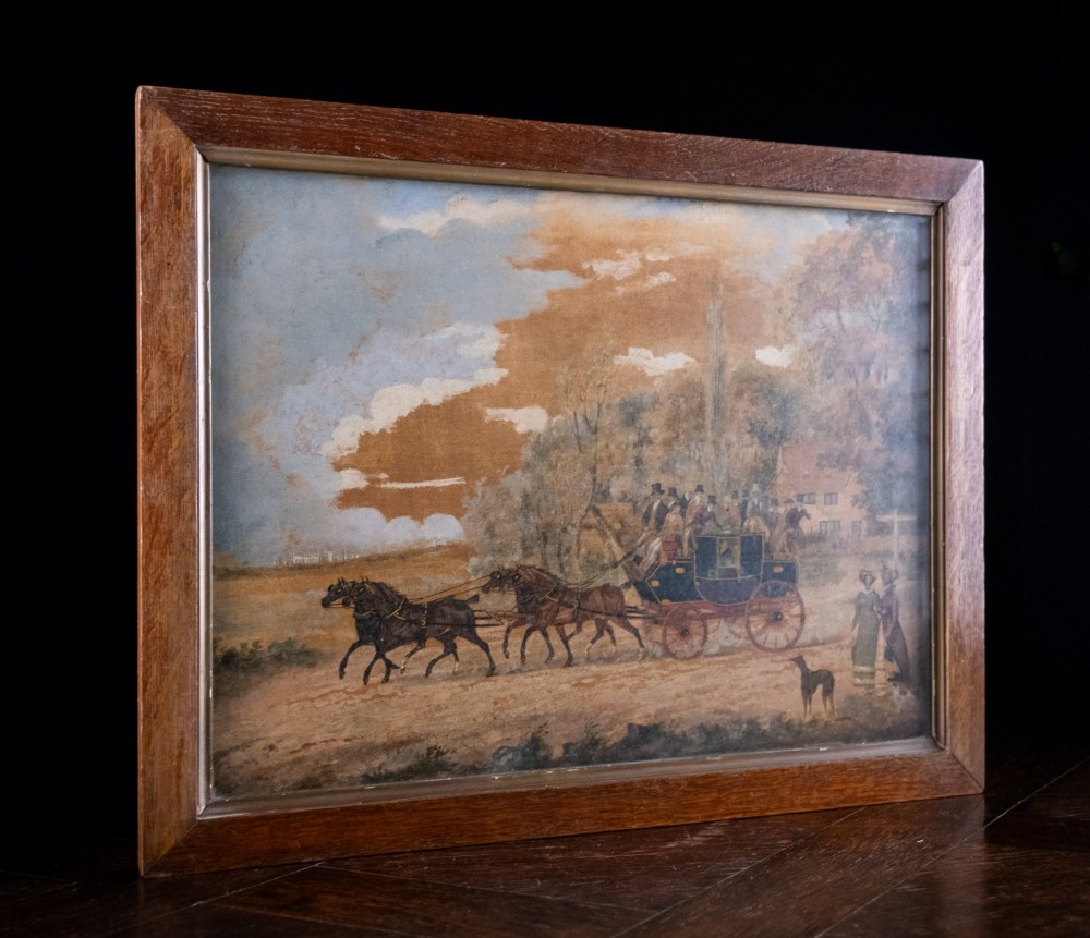 A framed 19th-century oil painting on board depicting a horse-drawn stagecoach travelling along a rural dirt road past figures and a cottage under a cloudy sky. View IX