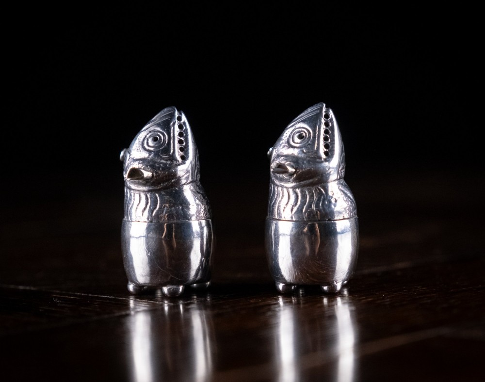 A pair of Victorian sterling silver novelty pepper pots shaped as grotesque birds smoking pipes. View III