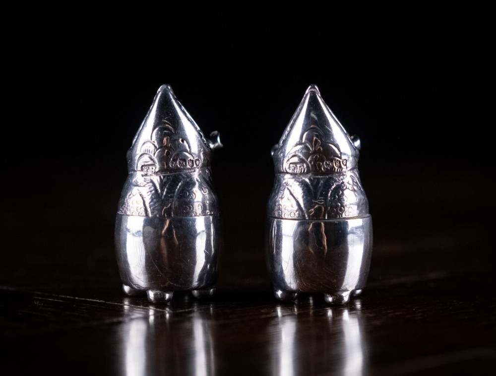 A pair of Victorian sterling silver novelty pepper pots shaped as grotesque birds smoking pipes. View IV
