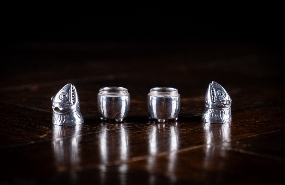 A pair of Victorian sterling silver novelty pepper pots shaped as grotesque birds smoking pipes. View VII