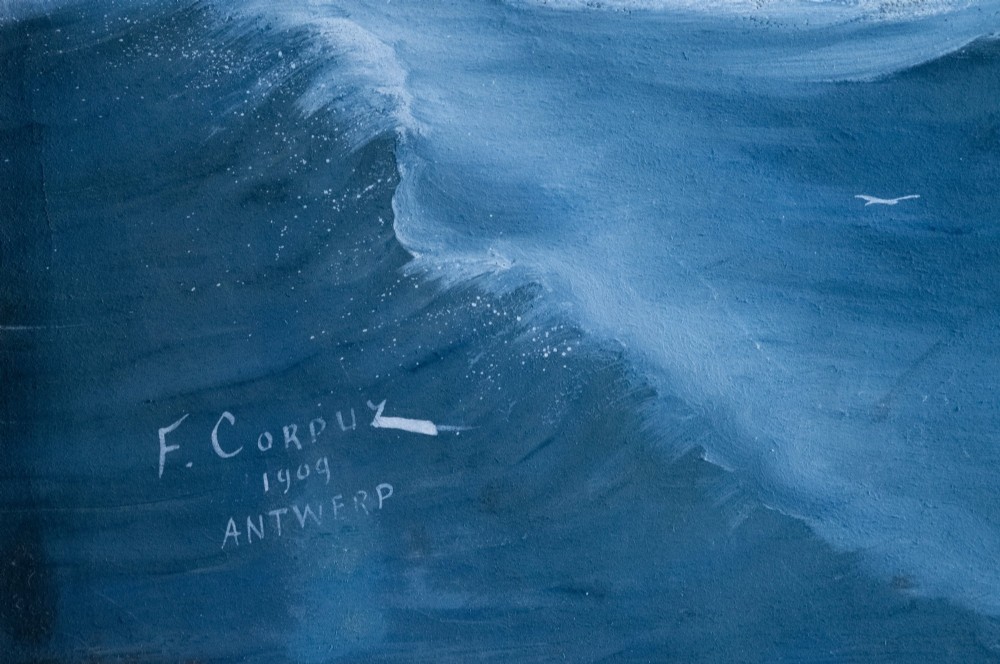 An Edwardian gouache painting depicting a steamship navigating rough blue ocean waves under a dark, stormy sky, encased in a plain oak frame. View VII