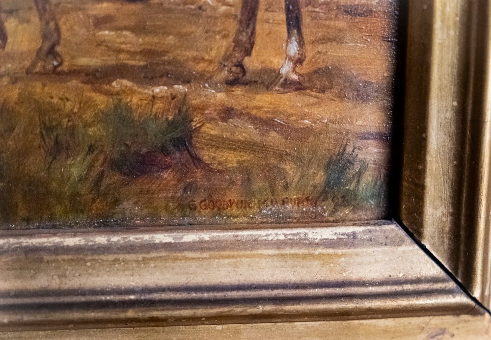 A 19th-century oil painting on panel depicting a gentleman in a red hunting coat atop a horse next to a timber gate in autumn woods. View VI