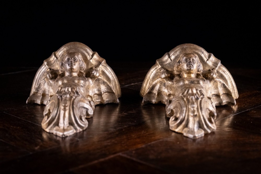 A pair of late Victorian gilt terracotta wall brackets shaped as winged sirens with decorative acanthus scrollwork bases. View VII
