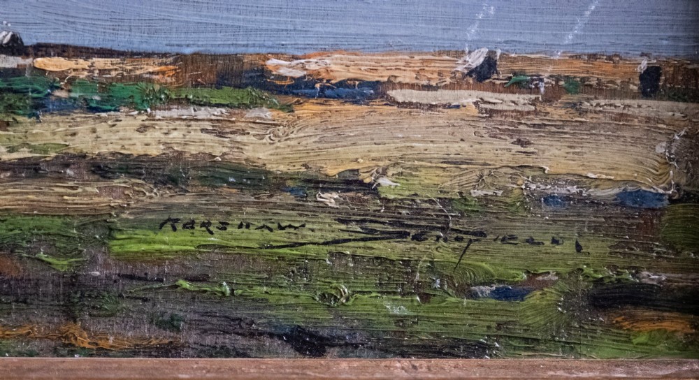 An antique oil painting on board portraying a stand of trees in an open landscape within a moulded gilt wooden frame. View V