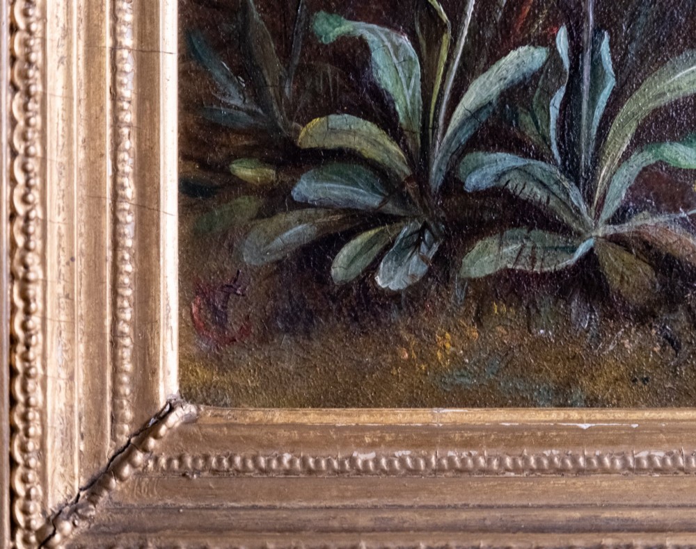 A 19th-century oil painting on canvas depicting purple flowers and a small red butterfly set within an ornate fluted gilt frame. View V