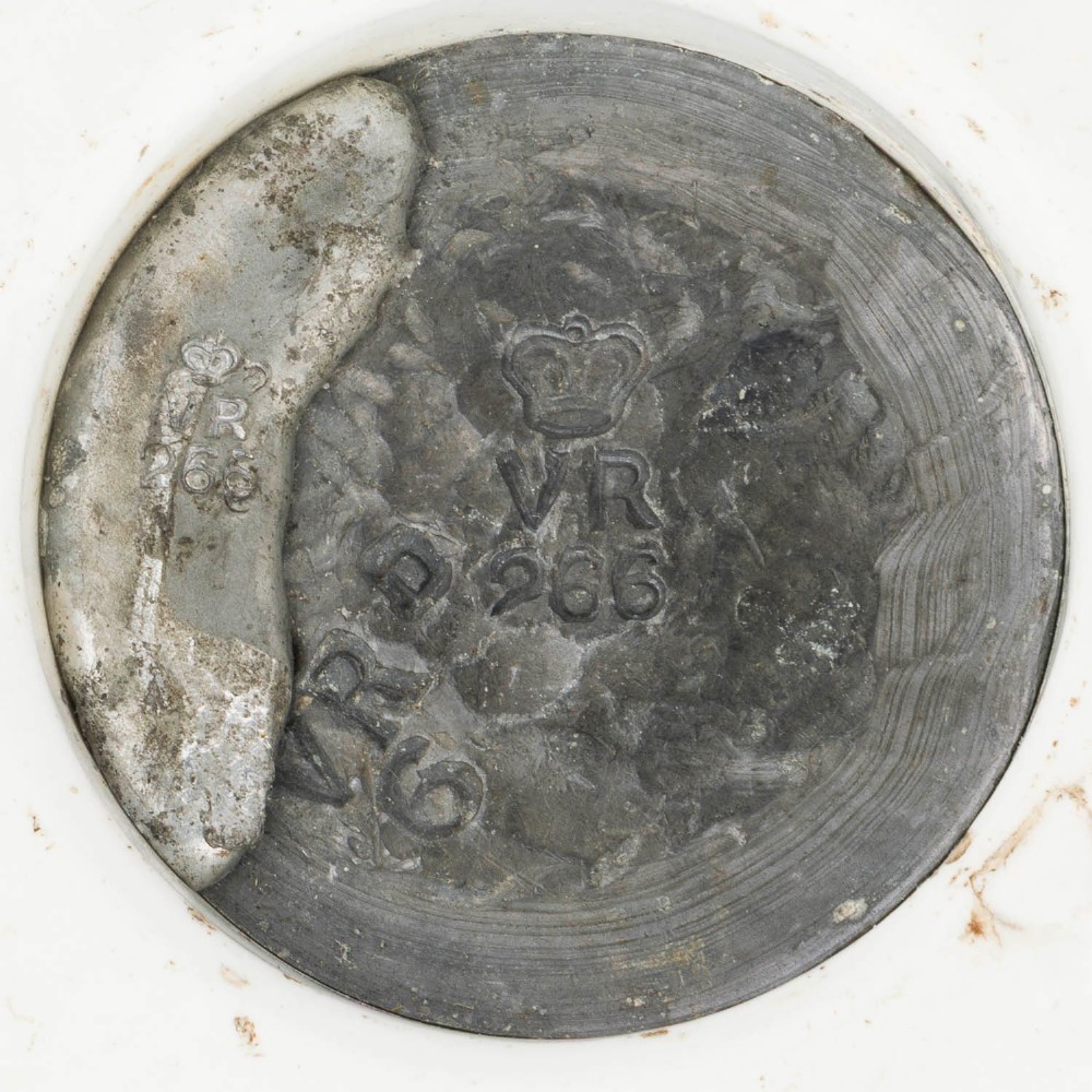 A pair of white glazed ceramic shop scale weights decorated with blue transfer-printed text and scroll borders for W and T Avery Birmingham. View VIII