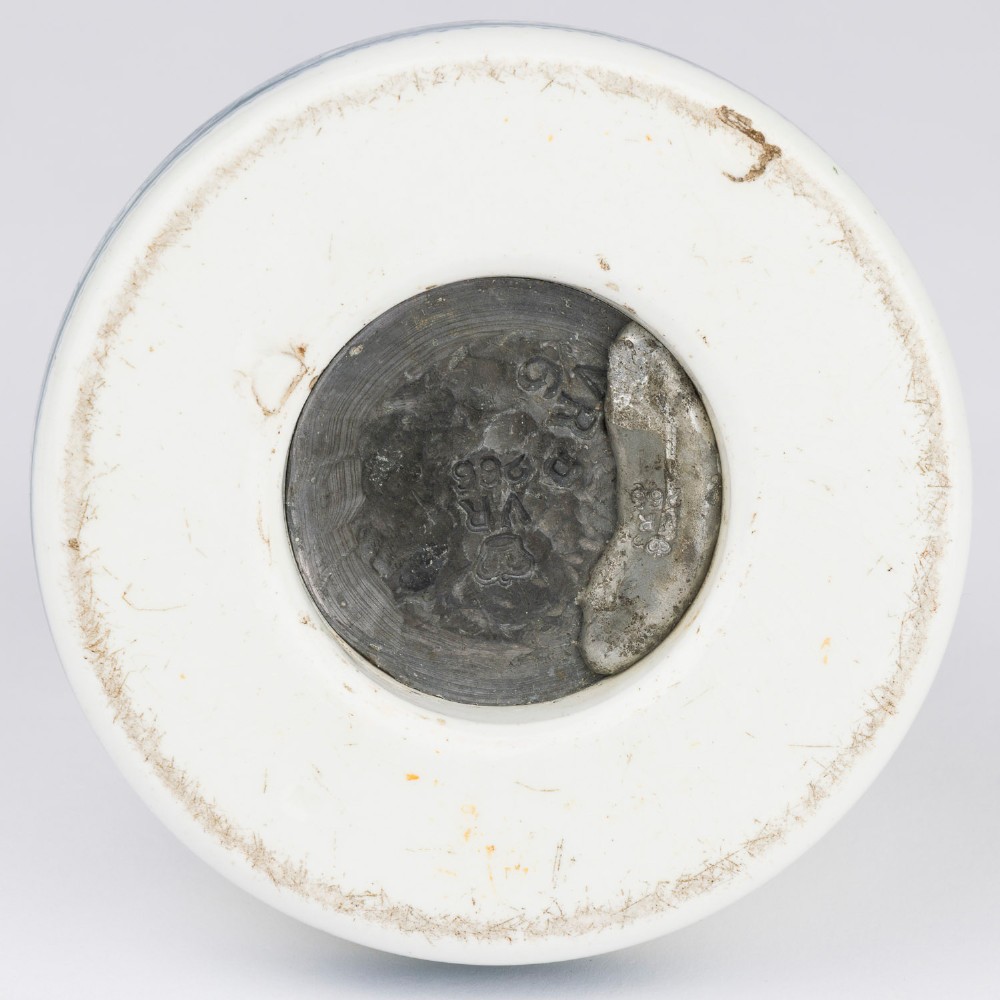 A pair of white glazed ceramic shop scale weights decorated with blue transfer-printed text and scroll borders for W and T Avery Birmingham. View IX