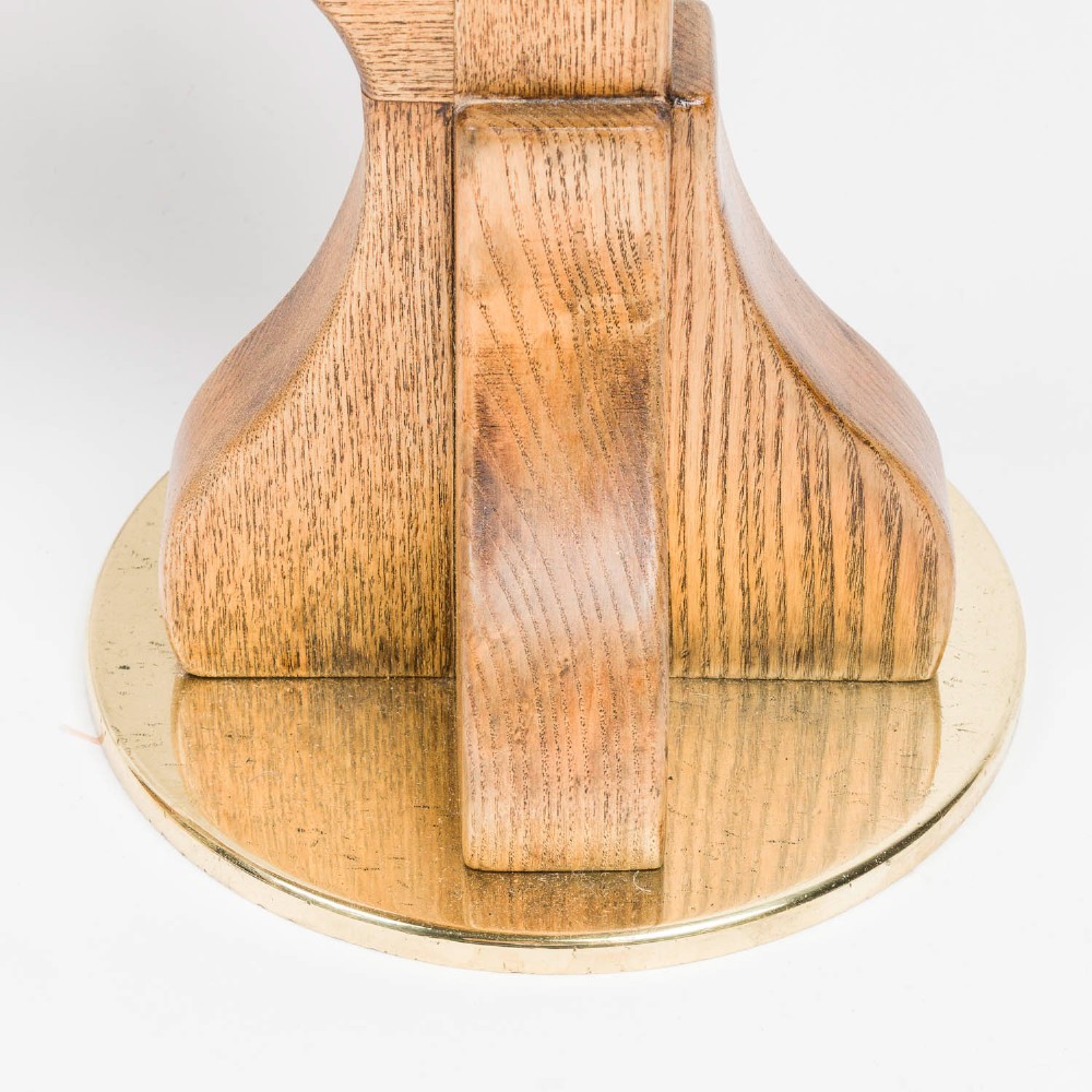 A polished brass Royal Navy ships bell engraved HMS Roysterer 1919, suspended inside a light oak wooden frame. View VI