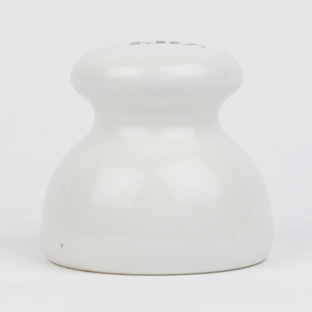 A white glazed ceramic four pound scale weight with black lettering reading Imperial 4 lb printed on top. View III