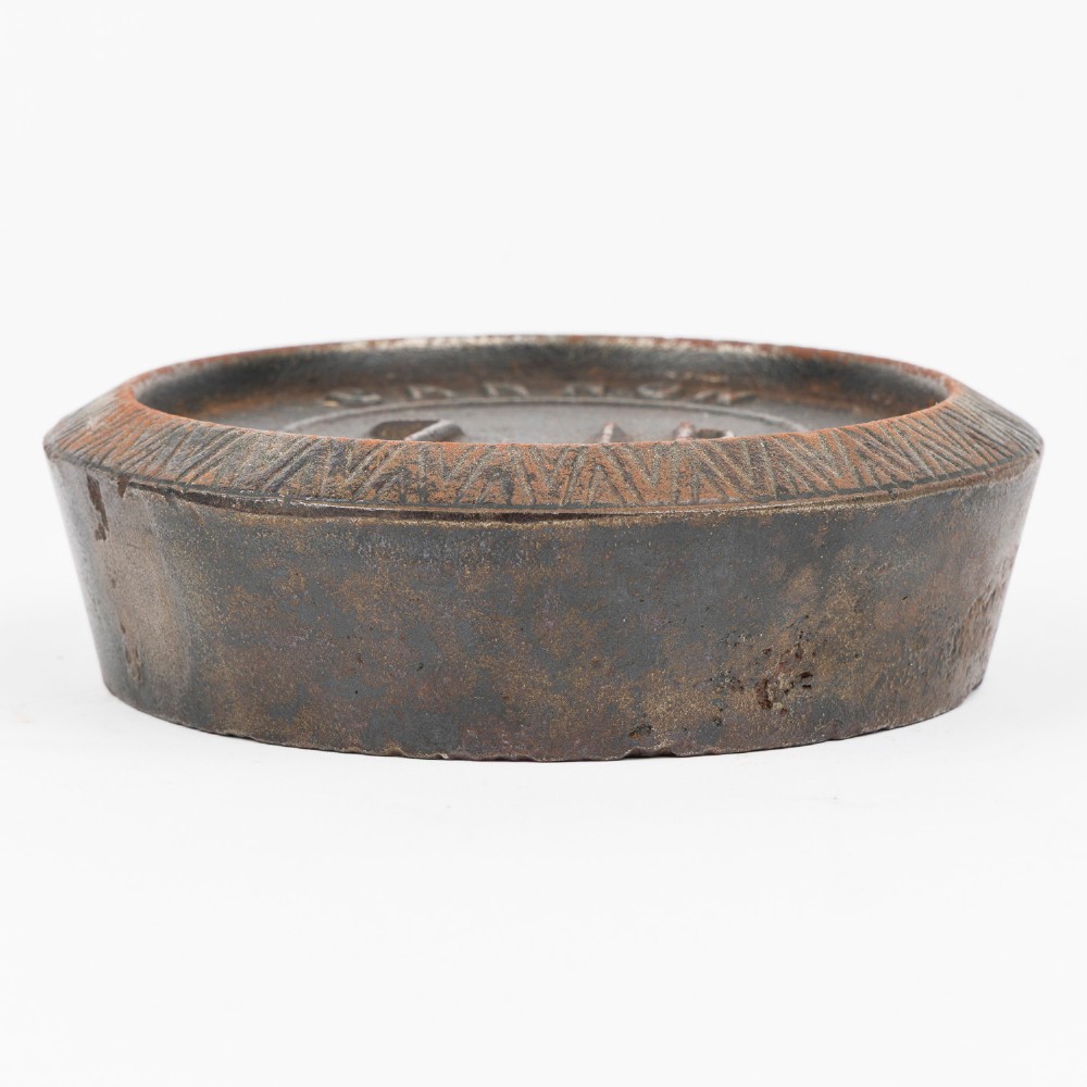 A set of six graduated cast iron nested imperial scale weights stacked into a pyramid shape, featuring textured chevron banding along the sides. View IV