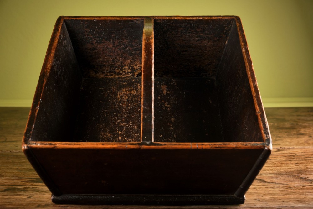 A dark brown antique pine cutlery tray featuring two open compartments separated by a central shaped divider with an integrated handle cut-out. View III
