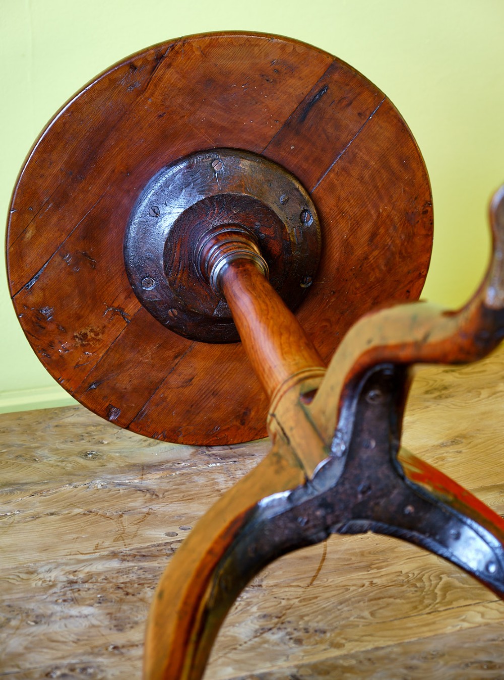 A small Georgian yew wood tripod table featuring a circular top, turned pedestal stem, and three cabriole legs with pad feet. View VII